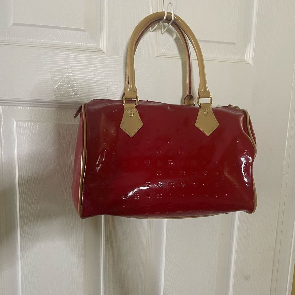 Arcadia leather Red  patent Boston bag tan trims and straps gold tone hardwares.